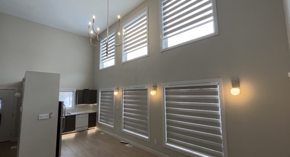 Great room with feature wall sconces
